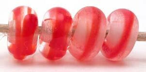 Dark Red Ribbon Color Notes: deep red ribbon cased in clear 5x10 mm Available shapes and sizes:Round Bead Shapes: Available to order 8 to 15 mm with hole sizes ranging from 1.5 to 5 mm. See drop down menu for the exact options. Shown here in 8, 9 and 10 mm with both a 2.5 mm and 1.5 mm hole. 4 and 5 mm holes will fit European Charm style jewelry.Also available in a wavy disk or bead cap:. Pressed bead shapes:Lentil - 12x13 mm in size with a 1.5mm hole.: Pillow 13 mm square with a 1.5 mm hole.: Tab: Default 