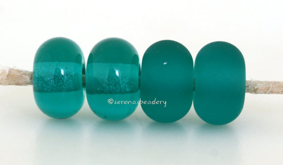 Aiko Color Notes: A vivid transparent teal green. Available shapes and sizes:Round Bead Shapes: Available to order 8 to 15 mm with hole sizes ranging from 1.5 to 5 mm. See drop down menu for the exact options. Shown here in 8, 9 and 10 mm with both a 2.5 mm and 1.5 mm hole. 4 and 5 mm holes will fit European Charm style jewelry.Also available in a wavy disk or bead cap:. Pressed bead shapes:Lentil - 12x13 mm in size with a 1.5mm hole.: Pillow 13 mm square with a 1.5 mm hole.: Tab: Default Title