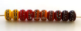 Fall Harvest Fall Harvest colors with fine silver droplets. Choose one pair or the set of 10 beads. The colors are brown, red, deep orange, light orange, and bright yellow.Bead Size: 6x11 mmAmount: 2 or 10 BeadsHole Size: 2.5 mm Glossy,Brown,Glossy,Red,Glossy,Deep Orange,Glossy,Light Orange,Glossy,Yellow,Glossy,Set of 5 Pairs,Matte,Brown,Matte,Red,Matte,Deep Orange,Matte,Light Orange,Matte,Yellow,Matte,Set of 5 Pairs