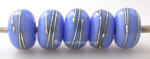 DARK PERIWINKLE Blue with fine SILVER Wraps dark periwinkle blue wrapped with fine silver wire lampwork glass beadsI can make these with silver dots also upon request. Thanks!~~~~~~~~~~~~~~~~~~~~~~~~~~6x11, 12 or 7x13 mm5 Beads2.5 mm hole Glossy,11 mm,Glossy,12 mm,Glossy,13 mm,Matte,11 mm,Matte,12 mm,Matte,13 mm