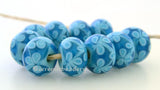 Turquoise Capri Blue Flowers one pair of light turquoise and capri blue beads with either light or dark turquoise flowers 6x12 mm 2.5 mm hole Glossy,light turquoise,Glossy,dark turquoise,Matte,light turquoise,Matte,dark turquoise
