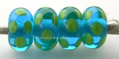 Aqua Pea Green Dice Dots An aqua base with pea green dice dots. 5x11 mm price is per bead Glossy,Matte