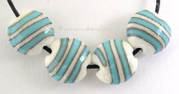 Ivory and Turquoise Lentil Stripes ivory lentils with turquoise spiral stripesshown as 11x12 mm, also availble in 14x14 mmprice is per bead Glossy,11x12mm,Glossy,14x14mm,Matte,11x12mm,Matte,14x14mm