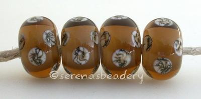 Smoke Topaz White Heart Silvered Ivory Dice Smoke topaz white heart with silvered ivory dice dots. 5x12 mm price is per bead Glossy,Matte