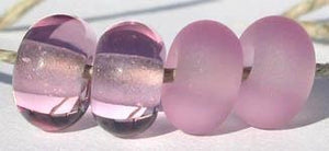 Lavender Blue Transparent Color Notes: nice shade, lighter than dark lavender and a bit less expensive 5x10 mm Available shapes and sizes:Round Bead Shapes: Available to order 8 to 15 mm with hole sizes ranging from 1.5 to 5 mm. See drop down menu for the exact options. Shown here in 8, 9 and 10 mm with both a 2.5 mm and 1.5 mm hole. 4 and 5 mm holes will fit European Charm style jewelry.Also available in a wavy disk or bead cap:. Pressed bead shapes:Lentil - 12x13 mm in size with a 1.5mm hole.: Pillow 13 m