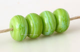 Marbled Limeade #2010 7x11 mm4 BeadsHole Size: 2.5 mm~ A marbled blend of bright lime green. ~ This lampwork glass bead set is ready to ship. Default Title