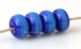 Marbled Ocean Tide #2015 7x11 mm4 BeadsHole Size: 2.5 mm~ A marbled blend of bright turquoise and cobalt blue. ~ This lampwork glass bead set is ready to ship.   Default Title