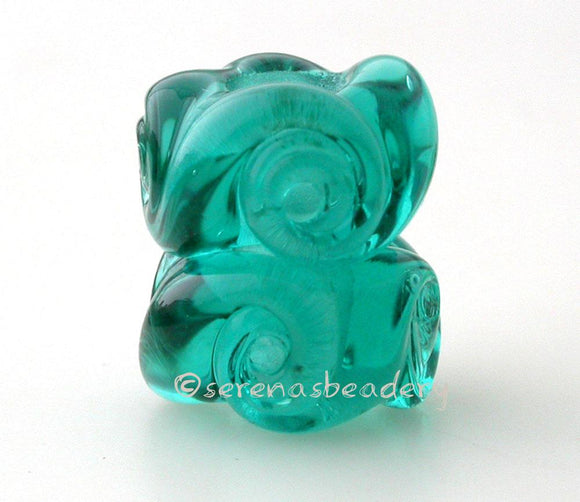 Twisted Teal Charm Pair A pair of transparent teal twisted glass beads that will fit your European charm style bracelet, although the bracelet is not for sale.~~~~~~~~~~~~~~~~~~~~~~~~~~7x15 mm2 Beads5 mm hole Glossy,Matte