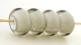 Gray Whiteheart #2077 6x12 mm4 BeadsHole Size: 2.5 mm~ 4 transparent gray white heart beads in a glossy finish. These beads can be etched upon request. ~ This lampwork glass bead set is ready to ship. Default Title