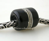 Just Black Euro Charm #2108 13x11 mm1 BeadHole Size: 5 mm~ All black glossy beach european charm with silvered ivory and fine silver. ~ This lampwork glass bead is ready to ship. Default Title