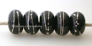 Black Fine Silver Extra Large 7x13 mm5 BeadsHole Size: 2.5 mm~ All black fine silver wrapped beads. The fine silver is burnished to the glass bead while still hot in the flame. ~ Default Title