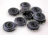 Black Fine Silver Disks A set of black discs wrapped in fine silver. 3x14mm Glossy,Matte