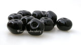 Black Nuggets 6x9 mm10 BeadsHole Size: 1.5 mm~ Teeny tiny little hand-shaped nuggets in black. ~ This lampwork bead set is ready to ship.   Default Title