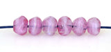 Streaky Pink Nuggets #2072 6x9 mm6 BeadsHole Size: 1.5 mm~ Teeny tiny little hand-shaped nuggets in a deep purple. ~ These lampwork glass beads are ready to ship. Default Title