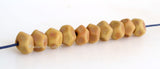 Honey Beige Matte Nugget #2098 Tiny little nugget rock in honey beige.~~~~~~~~~~~~~~~~~~~~~~~~~~10 Beads5x9 mm1.5 mm hole These lampwork glass beads are ready to ship. Default Title