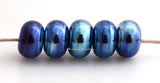 Blue Silver Luster #2124 5 blue silver luster spacers7x11 mm2.5 mm hole These lampwork glass beads are ready to ship. Default Title