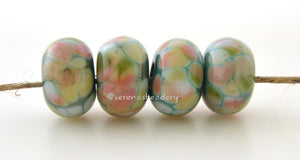 Super Soft Minty green lampwork glass beads with yellow, peach, olive, and cream.Bead Size: 6x11-12 or 7x13-14 mmHole Size: 2.5 mmprice is for one bead with a discount for 4 or more 11-12 mm,Glossy,13-14 mm,Glossy,11-12 mm,Matte,13-14 mm,Matte