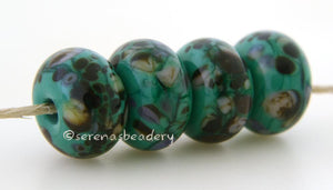 Cypress Petroleum green lampwork glass beads with purple, cream and dark brown frit.Bead Size: 6x11-12 or 7x13-14 mmHole Size: 2.5 mmprice is for one bead with a discount for 4 or more 11-12 mm,Glossy,13-14 mm,Glossy,11-12 mm,Matte,13-14 mm,Matte