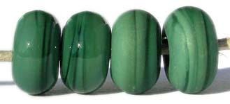 Dark Grass Green Opaque Color Notes: opaque dark green - streaky 5x10 mm Donut- This is my basic spacer size. It is made on a 3/32 mandrel with a 2.5 mm hole. Other available sizes and shapes: 4x8 mm Round- A miniature sized spacer with a 1.5 mm hole. Lentil- 12x13 mm in size with a 1.5mm hole. Pillow- 14 mm square with a 1.5 mm hole. Disk- 3x13 mm with a 2.5 mm hole. Also 6x12 mm donut- A larger donut with a 2.5 mm hole. 8x15 mm Super Sized- A humungous spacer with a 3.5 mm hole. It is perfect for stringin