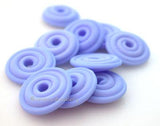 Periwinkle Matte Wavy Disk Spacer 10 wavy disks in periwinkle matte with a matte finish2 sizes available: 11-12 mm with 1.5 mm hole or 13-14 mm with 2.5 mm holeprice is per 10 disks 11-12 mm 1.5 mm hole,12-13 mm 2.5 mm hole