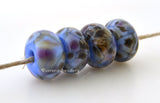 Whistle Dixie Light blue lampwork glass beads with dark brown, cream, and purple.Bead Size: 6x11-12 or 7x13-14 mmHole Size: 2.5 mmprice is for one bead with a discount for 4 or more 11-12 mm,Glossy,13-14 mm,Glossy,11-12 mm,Matte,13-14 mm,Matte