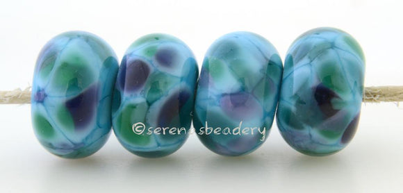 Northern Light Turquoise blue lampwork glass beads with purple, green, and steel blue frit.Bead Size: 6x11-12 or 7x13-14 mmHole Size: 2.5 mmprice is for one bead with a discount for 4 or more 11-12 mm,Glossy,13-14 mm,Glossy,11-12 mm,Matte,13-14 mm,Matte
