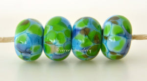 Tortuga Bay Turquoise blue lampwork glass beads with lime green, brown, and blue.Bead Size: 6x11-12 or 7x13-14 mmHole Size: 2.5 mmprice is for one bead with a discount for 4 or more 11-12 mm,Glossy,13-14 mm,Glossy,11-12 mm,Matte,13-14 mm,Matte