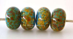 Dark Sky Blue Raku Dark sky blue lampwork glass beads with brown raku.Bead Size: 6x11-12 or 7x13-14 mmHole Size: 2.5 mmprice is for one bead with a discount for 4 or more 11-12 mm,Glossy,13-14 mm,Glossy,11-12 mm,Matte,13-14 mm,Matte