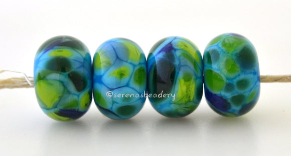Surfs Up Dark blue lampwork glass beads with blue, dark green, lime green, and teal.Bead Size: 6x11-12 or 7x13-14 mmHole Size: 2.5 mmprice is for one bead with a discount for 4 or more 11-12 mm,Glossy,13-14 mm,Glossy,11-12 mm,Matte,13-14 mm,Matte