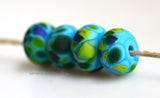 Surfs Up Dark blue lampwork glass beads with blue, dark green, lime green, and teal.Bead Size: 6x11-12 or 7x13-14 mmHole Size: 2.5 mmprice is for one bead with a discount for 4 or more 11-12 mm,Glossy,13-14 mm,Glossy,11-12 mm,Matte,13-14 mm,Matte