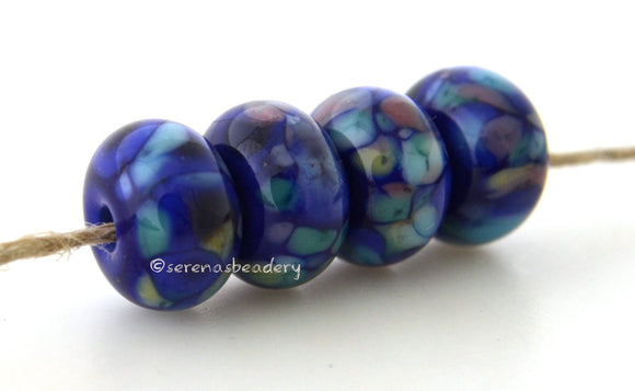Come Again Dark blue lampwork glass beads with light blue, white, pink and light brown.Bead Size: 6x11-12 or 7x13-14 mmHole Size: 2.5 mmprice is for one bead with a discount for 4 or more 11-12 mm,Glossy,13-14 mm,Glossy,11-12 mm,Matte,13-14 mm,Matte