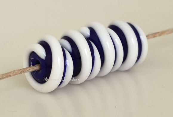 Cobalt Blue White Raised Spiral dark cobalt blue beads with a raised white spiral 6x12 mm price is per bead Default Title