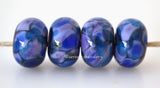 Nobility Light violet lampwork glass beads with dark blue, purple, teal green and lilac.Bead Size: 6x11-12 or 7x13-14 mmHole Size: 2.5 mmprice is for one bead with a discount for 4 or more 11-12 mm,Glossy,13-14 mm,Glossy,11-12 mm,Matte,13-14 mm,Matte