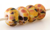 Sunset Yellow Pale yellow lampwork glass beads with brown, pink, and orange frit.Bead Size: 6x11-12 or 7x13-14 mmHole Size: 2.5 mmprice is for one bead with a discount for 4 or more 11-12 mm,Glossy,13-14 mm,Glossy,11-12 mm,Matte,13-14 mm,Matte
