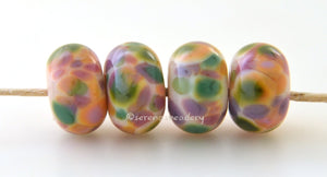 Whisper Soft Soft yellow lampwork glass beads with green, lilac, pink, plum, mauve and peach.Bead Size: 6x11-12 or 7x13-14 mmHole Size: 2.5 mmprice is for one bead with a discount for 4 or more 11-12 mm,Glossy,13-14 mm,Glossy,11-12 mm,Matte,13-14 mm,Matte