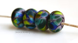 Winding Ways Dark purple lampwork glass beads with blue, dark green, lime green, and teal.Bead Size: 6x11-12 or 7x13-14 mmHole Size: 2.5 mmprice is for one bead with a discount for 4 or more 11-12 mm,Glossy,13-14 mm,Glossy,11-12 mm,Matte,13-14 mm,Matte
