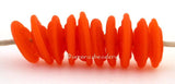 Tangerine Sparkle Matte Wavy Disk Spacer 10 wavy disks in tangerine sparkle, an odd lot glass with glitter2 sizes available: 11-12 mm with 1.5 mm hole or 13-14 mm with 2.5 mm holeprice is per 10 disks 11-12 mm 1.5 mm hole,12-13 mm 2.5 mm hole