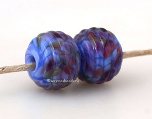 Exquisite Beauty Ribbed Pair #2087 A pair of round ribbed lampwork glass bead in blue with purple and peach.~~~~~~~~~~~~~~~~~~~~~~~~~~9x12 mm2 Beads2.5 mm hole These lampwork beads are ready to ship. Default Title