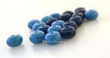 Far Out Blue Mini Spacers #1757 Size: 5x8 mm ~ Hole Size: 1.5 mm ~ 20 beads10 beads each in turquoise and galaxy blue These beads are ready to ship. Default Title
