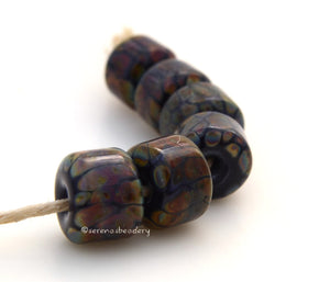 Purple Raku Rolos #1692 Size: 8x12 mmAmount: 6 BeadsHole Size: 2.5 mm~ Deep purple and raku in a rolo shape. ~ These beads are ready to ship. Default Title