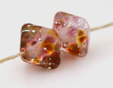 The Desire Crystal Pair #1776 Size: 13x13 mm ~ Amount: 2 Beads ~ Hole Size: 2.5 mm~ pink, peach and golden brown crystals with fine silver ~ These beads are ready to ship. Default Title