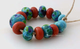 Amazing Graduated Set #1820 Size: 4x8 to 9x13 mm ~ Amount: 15 Beads ~ Hole Size: 2.5 mm~ Turquoise with purple, blue and green plus coral spacers. ~ These beads are ready to ship. Default Title