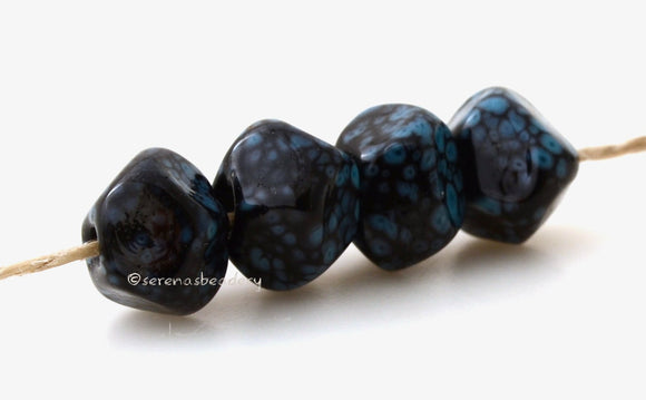 Black Turquoise Nugget #1845 8x12 mm4 Beads Hole Size: 2.5 mm~ Hand shaped nuggets in black splattered with turquoise blue. ~   These lampwork glass beads are ready to ship. Default Title