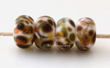 Forest Nymph Matte #1851 6x12 mm4 BeadsHole Size: 2.5 mm ~ White base bead with green, peach, and brown flecks. ~   These handmade lampwork beads are ready to ship. Default Title