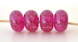 Eros Pink Bright transparent pink lampwork glass beads with light pink. Bead Size: 6x12 mm Hole Size: 2.5 mm price is for one bead with a discount for 4 or more Default Title