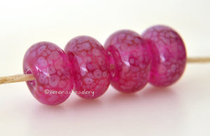 Eros Pink Bright transparent pink lampwork glass beads with light pink. Bead Size: 6x12 mm Hole Size: 2.5 mm price is for one bead with a discount for 4 or more Default Title