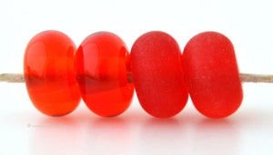 Rudolph Color Notes: A transparent red. Available shapes and sizes:Round Bead Shapes: Available to order 8 to 15 mm with hole sizes ranging from 1.5 to 5 mm. See drop down menu for the exact options. Shown here in 8, 9 and 10 mm with both a 2.5 mm and 1.5 mm hole. 4 and 5 mm holes will fit European Charm style jewelry.Also available in a wavy disk or bead cap:. Pressed bead shapes:Lentil - 12x13 mm in size with a 1.5mm hole.: Pillow 13 mm square with a 1.5 mm hole.: Tab: Default Title