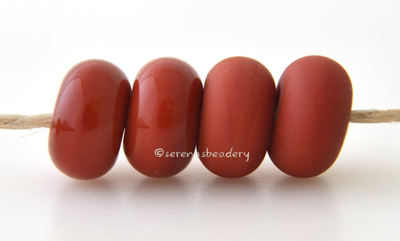 Mahogany Color Notes: An opaque red. Available shapes and sizes:Round Bead Shapes: Available to order 8 to 15 mm with hole sizes ranging from 1.5 to 5 mm. See drop down menu for the exact options. Shown here in 8, 9 and 10 mm with both a 2.5 mm and 1.5 mm hole. 4 and 5 mm holes will fit European Charm style jewelry.Also available in a wavy disk or bead cap:. Pressed bead shapes:Lentil - 12x13 mm in size with a 1.5mm hole.: Pillow 13 mm square with a 1.5 mm hole.: Tab: Default Title