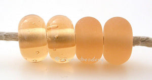 Peachy Keen Color Notes: A transparent peach. Available shapes and sizes:Round Bead Shapes: Available to order 8 to 15 mm with hole sizes ranging from 1.5 to 5 mm. See drop down menu for the exact options. Shown here in 8, 9 and 10 mm with both a 2.5 mm and 1.5 mm hole. 4 and 5 mm holes will fit European Charm style jewelry.Also available in a wavy disk or bead cap:. Pressed bead shapes:Lentil - 12x13 mm in size with a 1.5mm hole.: Pillow 13 mm square with a 1.5 mm hole.: Tab: Default Title