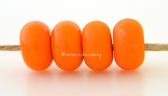 Butternut Color Notes: An opaque orange. Available shapes and sizes:Round Bead Shapes: Available to order 8 to 15 mm with hole sizes ranging from 1.5 to 5 mm. See drop down menu for the exact options. Shown here in 8, 9 and 10 mm with both a 2.5 mm and 1.5 mm hole. 4 and 5 mm holes will fit European Charm style jewelry.Also available in a wavy disk or bead cap:. Pressed bead shapes:Lentil - 12x13 mm in size with a 1.5mm hole.: Pillow 13 mm square with a 1.5 mm hole.: Tab: Default Title